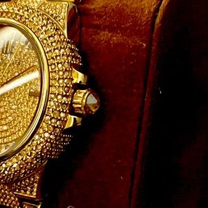 Micheal Kors gold and diamond watch.